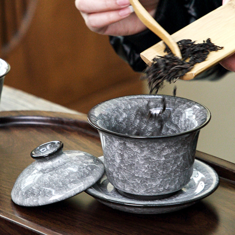 Black ice covered bowl tea set